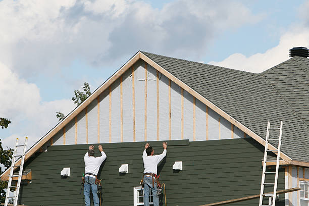 Professional Siding Installation technician working in Hollidaysburg, PA